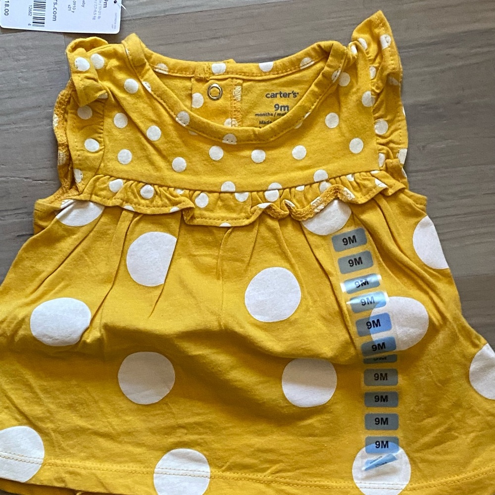 NWT girl’s romper by Carter’s